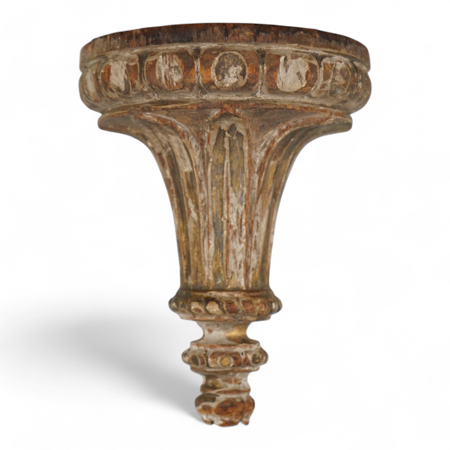 An 18th century parcel gilt carved wall bracket, 22cm high